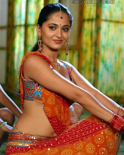 Anushka Shetty Hot Curvy Navel Exposed In Orange Outfit Glamsundari In