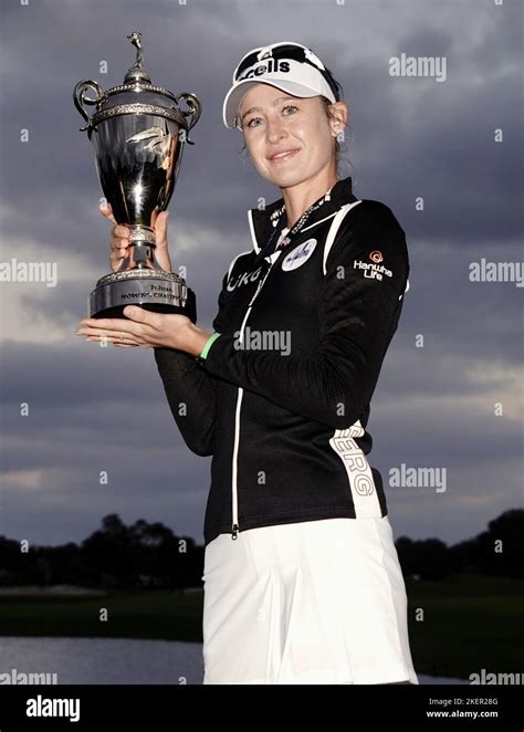 Nelly Korda Of The United States Holds The Victors Trophy After