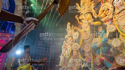 Hindu Purohit Worshipping Goddess Durga With Sari Traditional Hindu