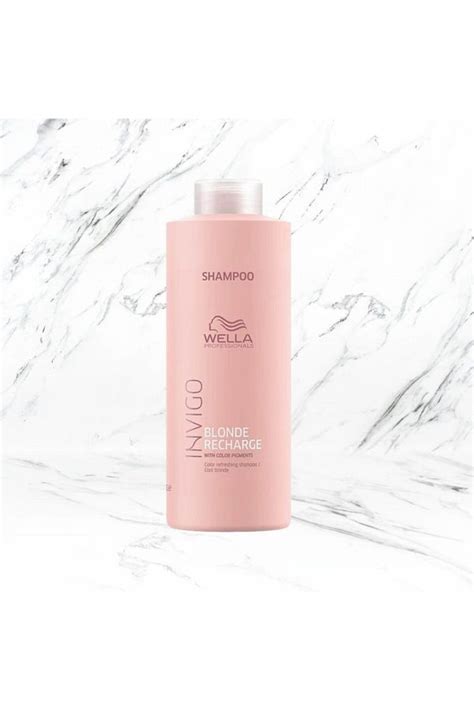 Wella Professionals Invigo Blonde Recharge Yellow Color On Purple Chromatic Circle Complement