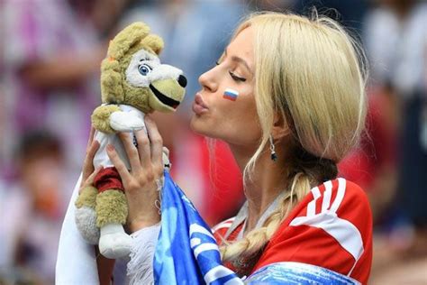 A Russias Fan Poses With The Fifa Russia 2018 World Cup Mascot