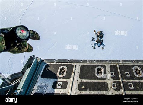 A Naval Special Warfare Member Performs A High Altitude Low Opening