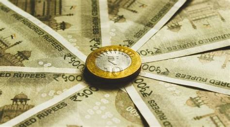 Rupee Gains 9 Paise To 8269 Against Us Dollar Business News The