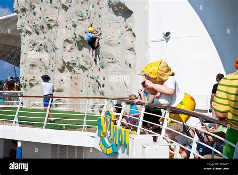 Cruise Passenger Climbing Artificial Rock Wall Onboard Royal Caribbean Navigator Of The Seas