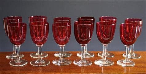 Lot A Matched Set Of Twelve Cranberry Wine Glasses C1880 With Round Funnel Bowls On Plain