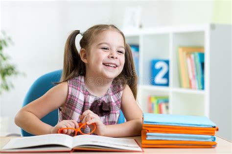 Cute Smiling Kid Reading Book In Children Room Stock Image Image Of