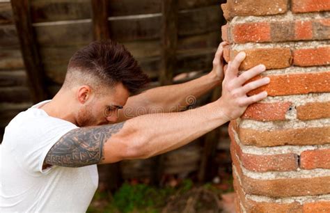 Attractive Guy Next To A Brick Wall Stock Image Image Of Macho Cute