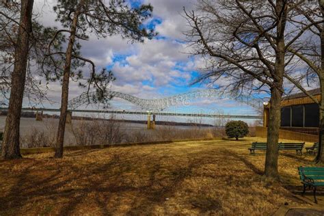 The Memphis And Arkansas Bridge Over The Vast Flowing Waters Of The