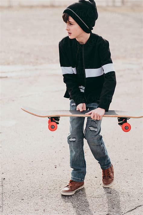 Boy Skateboarding Del Colaborador De Stocksy Melanie Defazio Stocksy