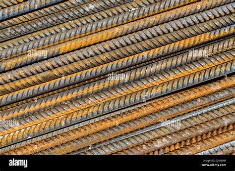 Rusty Steel Ribbed Construction Rods Rebar Background Stock Photo