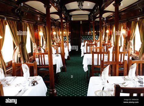 The Tables In Dining Car On Board The Luxurious Rovos Rail Train Are