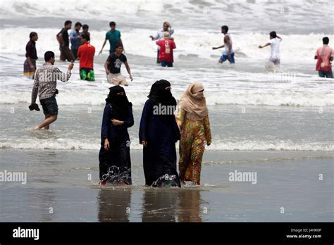 Tourists Bathe On The Bay Of Bengal At The Coxs Bazar Sea Beach It Is