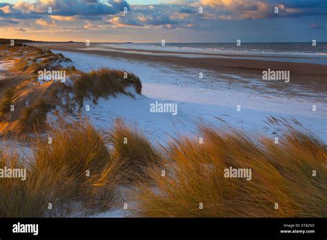 Sunset at holkham beach hi-res stock photography and images - Alamy