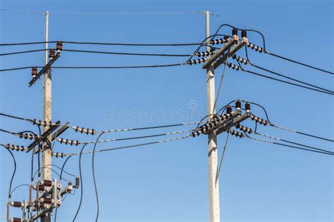 Electric Pole Connect High Voltage Electric Wires On Blue Sky Stock