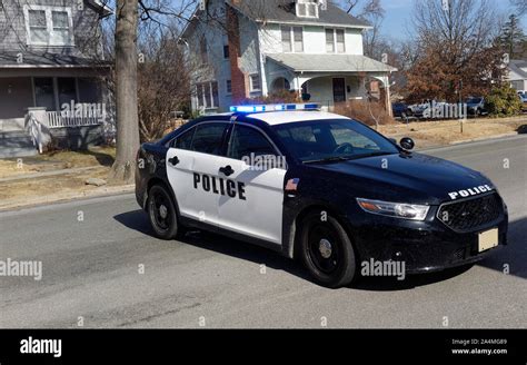 Police car barricade on residential neighborhood street Stock Photo - Alamy