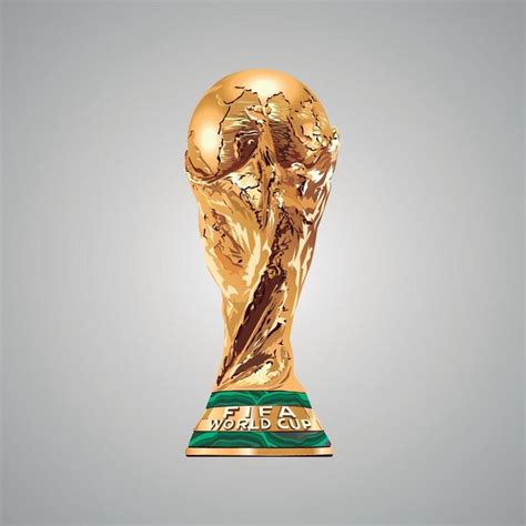 The World Cup Trophy Is Displayed In Front Of A Gray Background