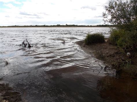 The Beautiful View of the Confluence of Two Rivers. Stock Photo - Image ...
