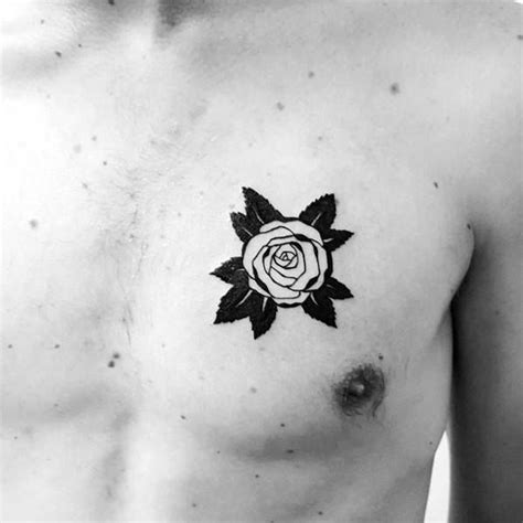 A Black And White Photo Of A Man S Chest With A Rose Tattoo On It