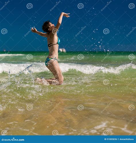 Woman Splashing Water In The Ocean Stock Photo Image Of Beautiful