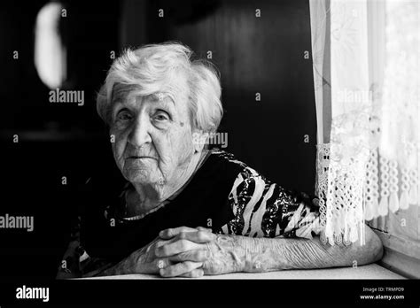 Elderly Woman At His Home Black And White Portrait Of An Old Grandma