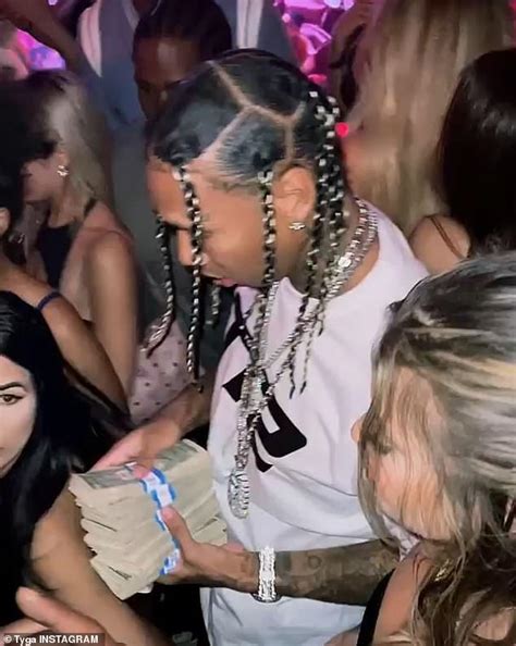 Tyga Makes It Rain Dollar Bills While Surrounded By Bikini Clad Women