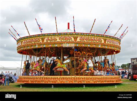 A Merry Go Round At A Vintage Fun Fair In Wiltshire Uk Stock Photo Alamy