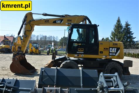 CATERPILLAR M313D KOPARKA KOŁOWA KM Rent