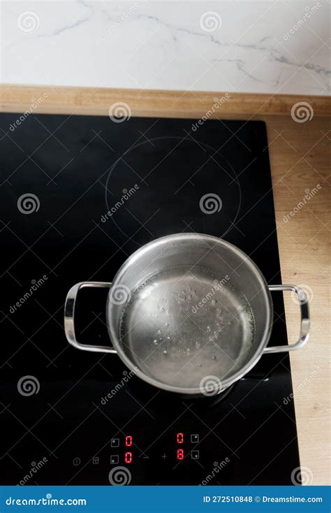 Boiling Water in Induction Cooktop Stock Photo - Image of design, home: 272510848