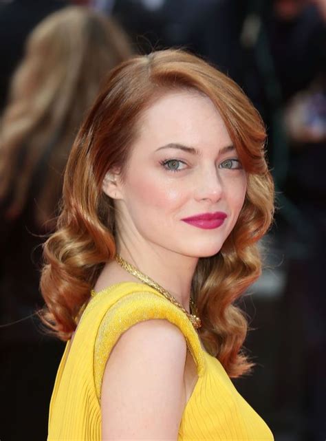 Emma Stone Wears Fuchsia Lipstick With A Yellow Dress To Promote