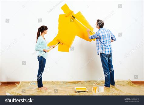 229 Couple Painting Wall Orange Royalty-Free Photos and Stock Images ...