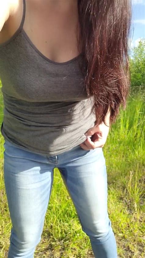 Busty MILF Pisses Her Jeans Outside ThisVid