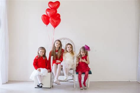 Girls with Red Heart-shaped Balloons on Birthday Party Stock Image ...