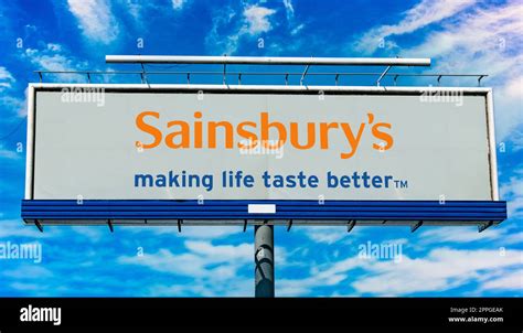 Advertisement Billboard Displaying Logo Of Sainsburys Stock Photo Alamy