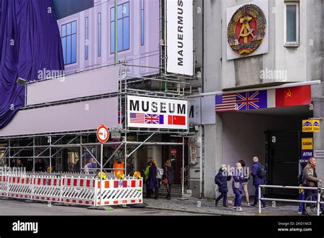 Tourists In Front Of The Museum At Checkpoint Charlie The Former