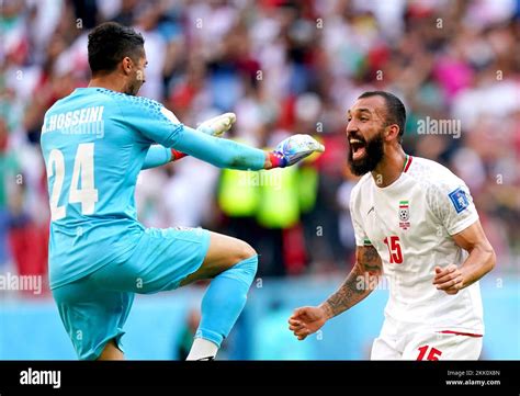 Iran Goalkeeper Hossein Hosseini Left Celebrates With Roozbeh Cheshmi At The End Of The Fifa