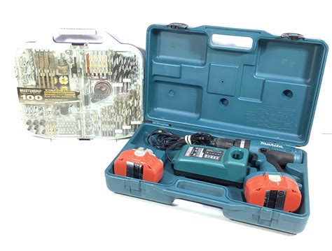 Lot - Makita Portable Drill & Drill Bit Set