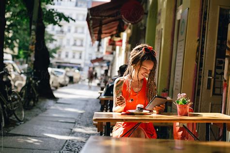 Woman Reading E Book By Stocksy Contributor Mosuno Stocksy