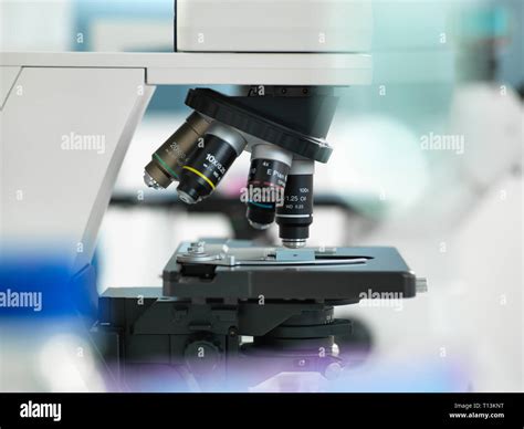 Microscope with a microscope plate in the laboratory Stock Photo - Alamy