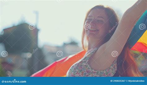Woman Holding The Rainbow Flag And Enjoying Blue Sky Beautiful The Concept For Same Sex Couples