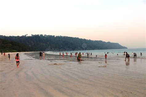 Tourists Relaxing and Enjoying the Sunset at Radhanagar Beach, Havelock Island Editorial Stock ...