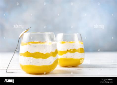 Mango Smoothie With Yogurt In Two Glasses Stock Photo Alamy