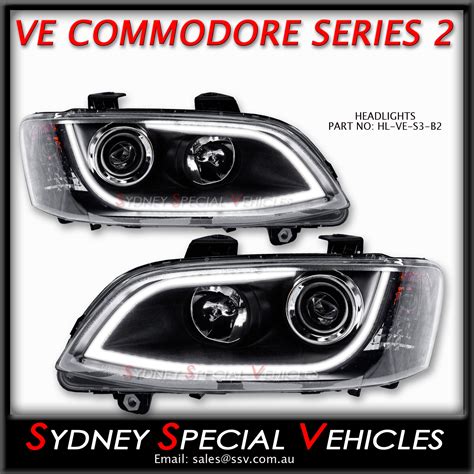 HEADLIGHTS FOR VE COMMODORE SERIES 2 BLACK DRL WITH CONTINUOUS LED STRIP