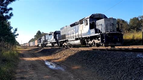 Trens da rumo no Cruzamento simultâneo no Barreiro Sd40 de containers