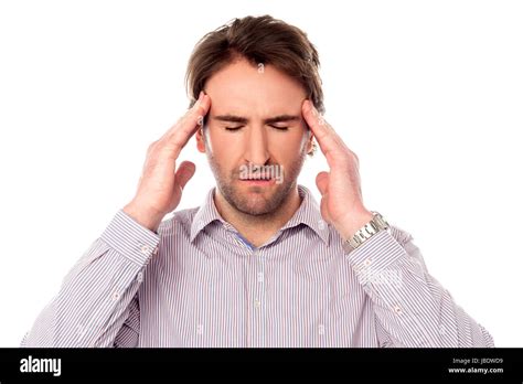 Man Suffering From Headache Wincing Stock Photo Alamy
