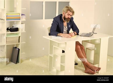Teleworking Man In Home Office Mature Businessman In Jacket Is Using
