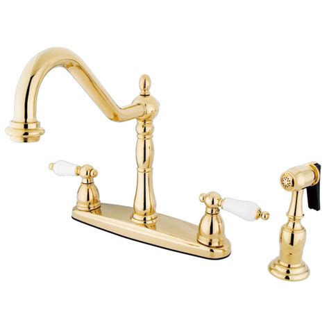 Kingston Brass Heritage 2 Handle Standard Kitchen Faucet With Side Sprayer In Polished Brass