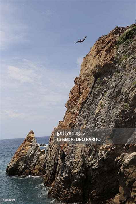 A Cliff Diver Jumps At La Quebrada In Acapulco Mexico On August 14