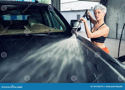 Young Woman Washes A Car In A Car Wash Stock Image Image Of Sensual