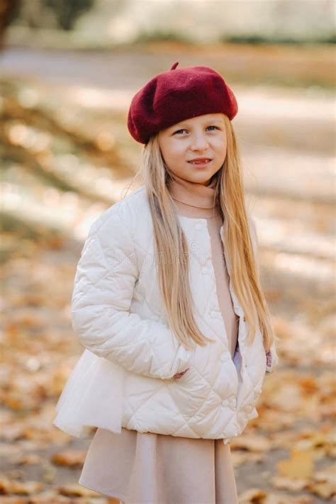 A Happy Girl In A Cap Walking In The Autumn Park Stock Image Image Of
