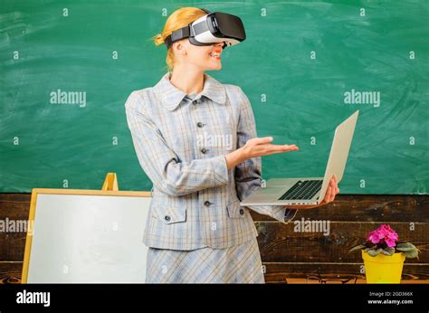 Teacher With Laptop In Vr Headset Modern Technologies In Smart School